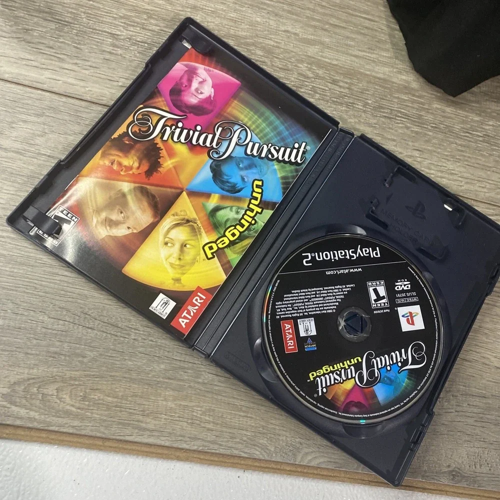 Trivial Pursuit Unhinged Sony PlayStation 2 PS2 Atari 2004 Complete CIB Tested
